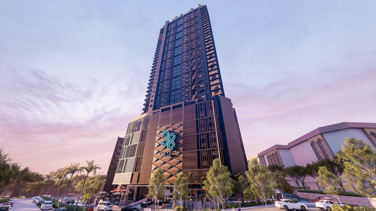 Residensi 38 Bangsar — the tower at dusk above its retail base