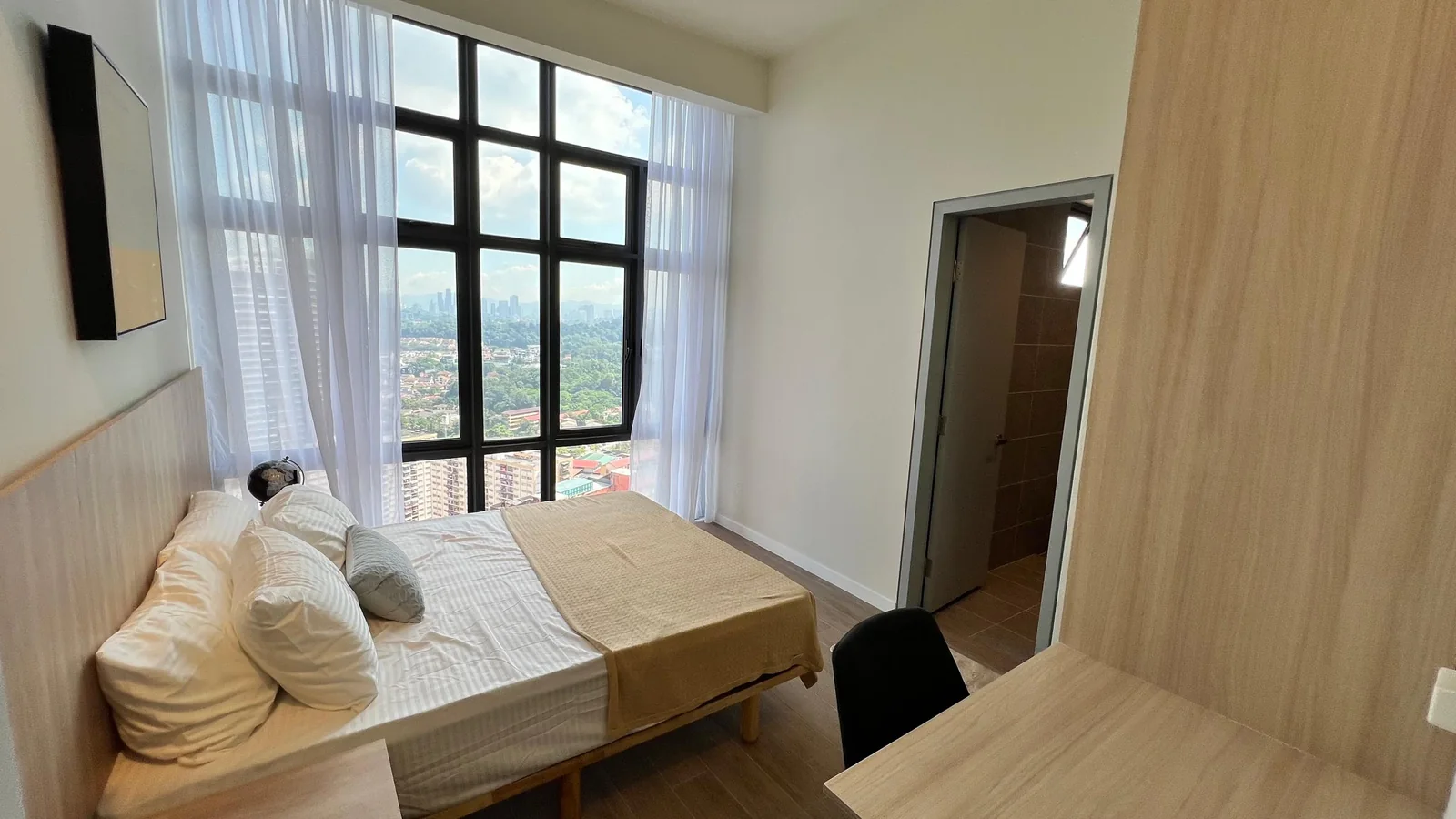Residensi 38 Bangsar show unit — master bedroom with timber accents