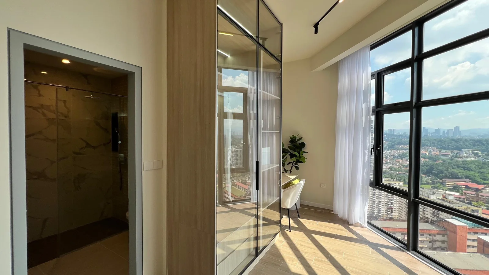 Residensi 38 Bangsar show unit — entry foyer with mirror and timber flooring