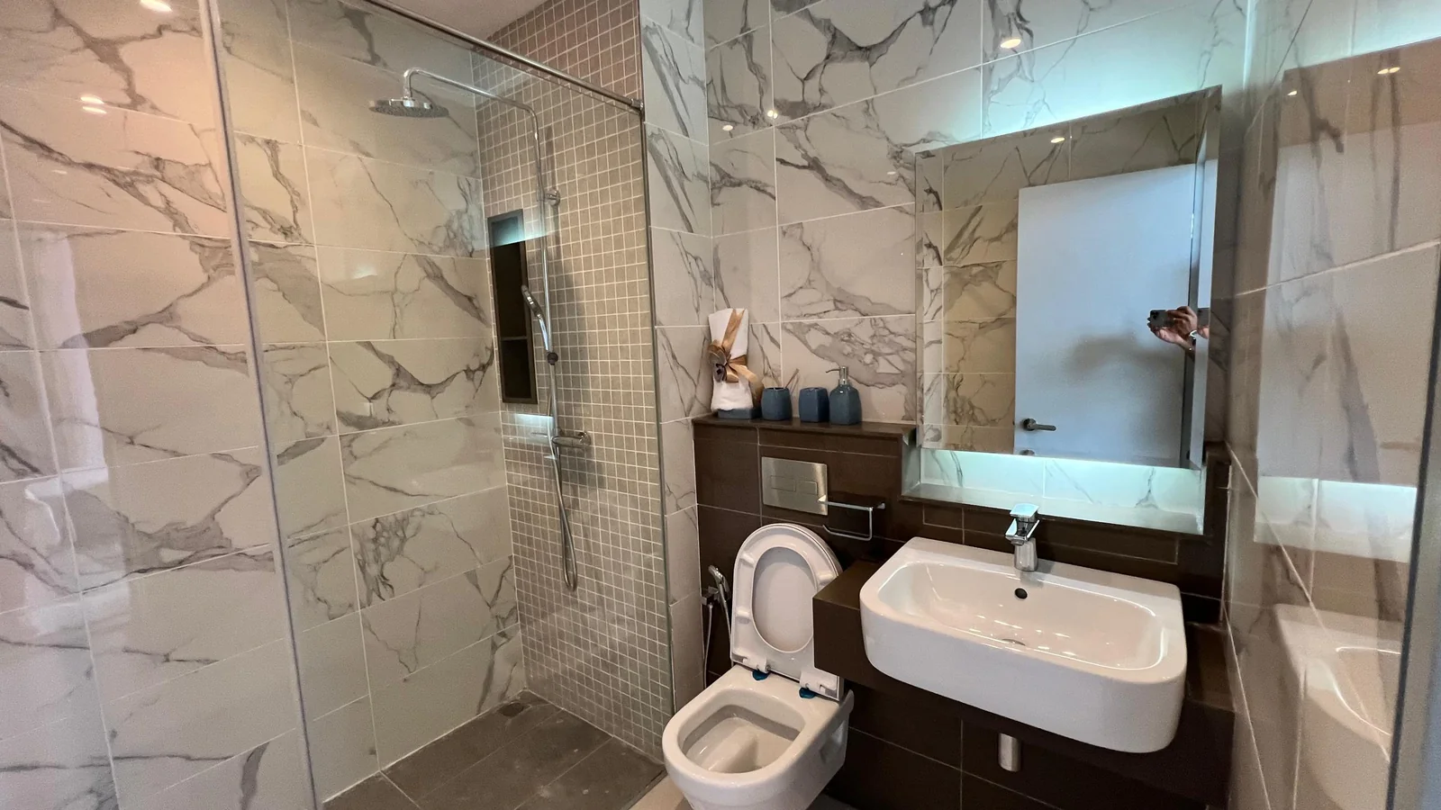 Residensi 38 Bangsar show unit — marble bathroom with walk-in shower and vanity