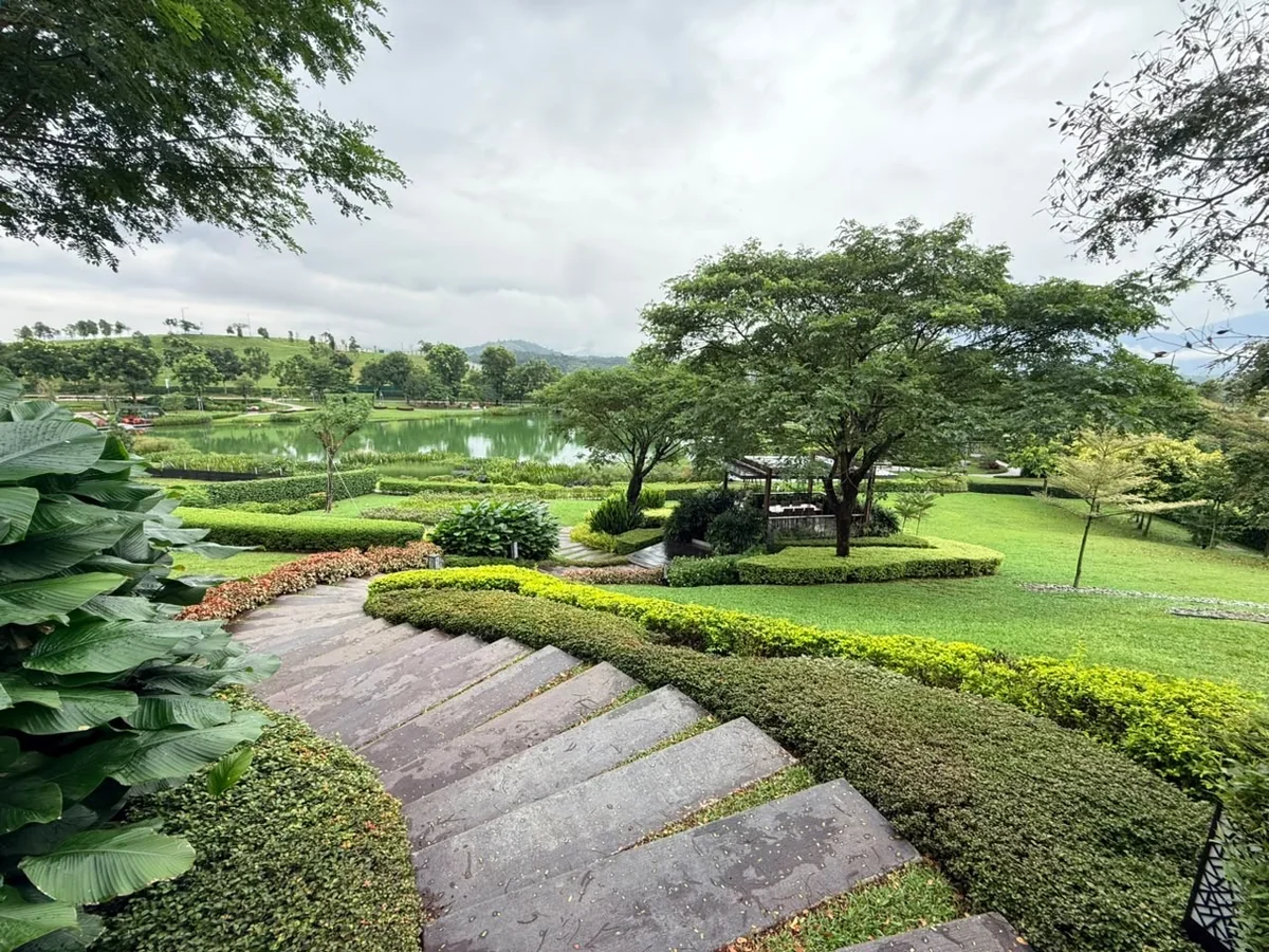 Anyara Hills — stone steps down to the central lake