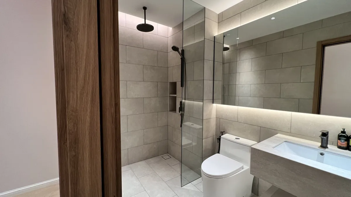 Armani Hallson show unit — bathroom with glass shower stall